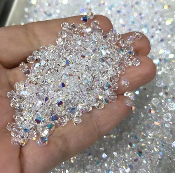 Celestial 3mm Crystal AB (001AB) - Janjan Bicone Cut Beads